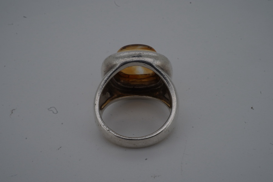 Paloma Picasso for Tiffany & Co., a citrine ring, set with a sugarloaf cabochon citrine, collet-set in bicoloured silver, size K, signed Tiffany & Co. and Paloma Picasso, British hallmarks for silver, pouch stamped Tiffa